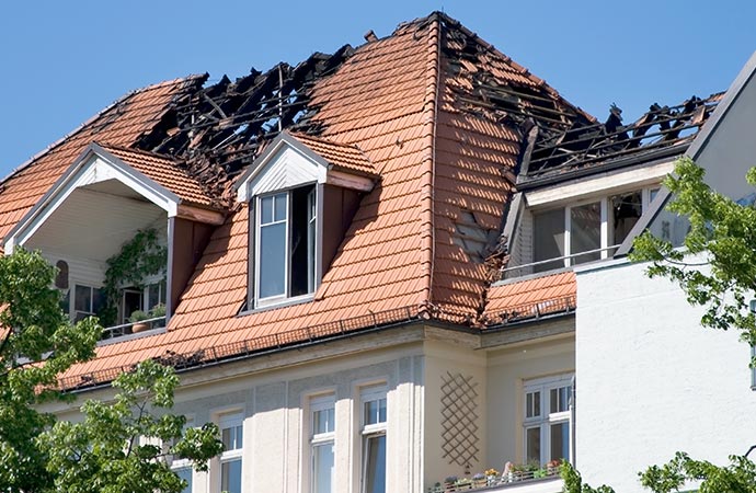 Fire damaged house roof