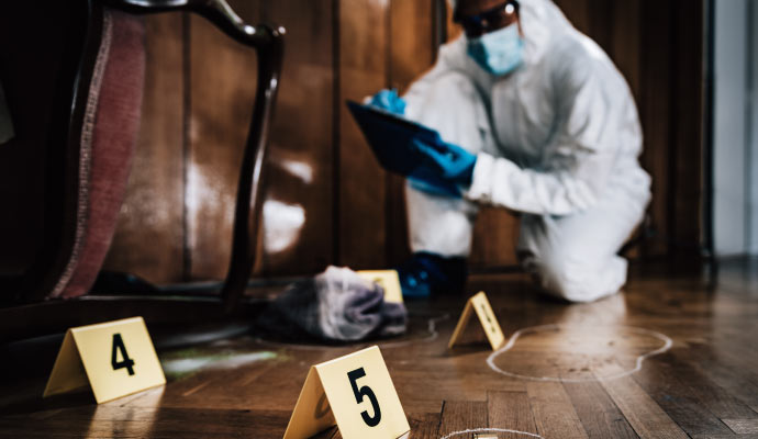 professional worker cleaning trauma scene