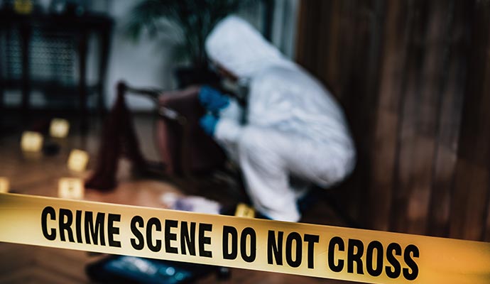 professional worker cleaning a trauma scene