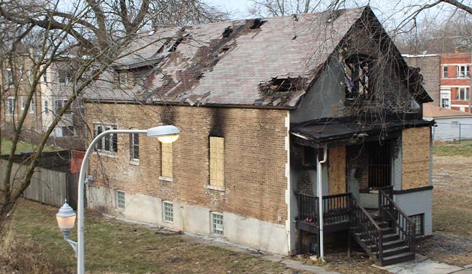 Board-up services for fire damaged house