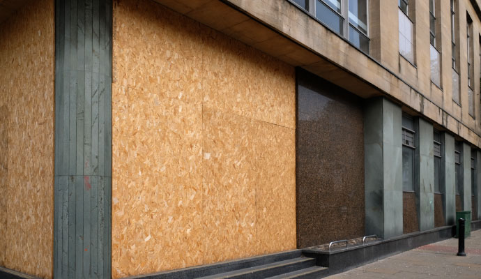 Boarded up wall of a building