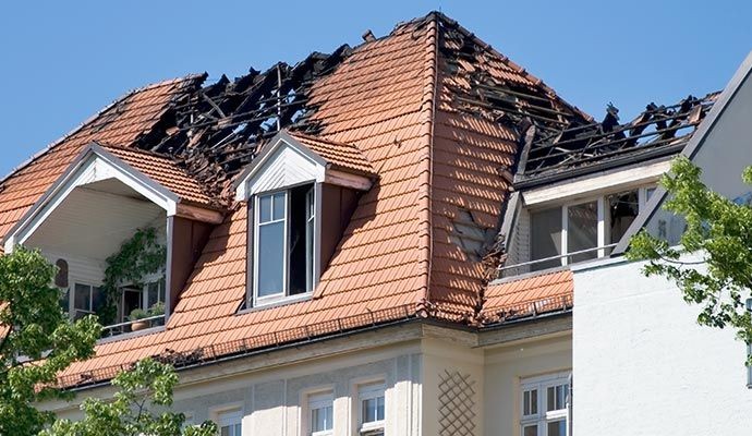 Fire damaged house roof