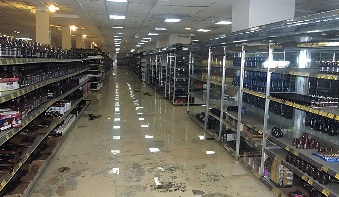 Commercial store interior with standing water on floors 