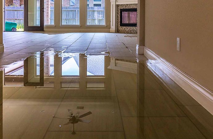 flooded floor fan fire place water damage restoration