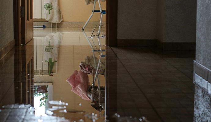 Water damaged floor due to plumbing overflow