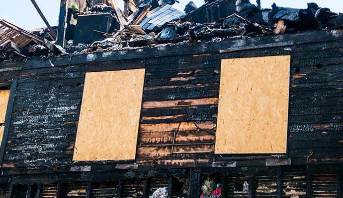 Board up service for a fire damaged house