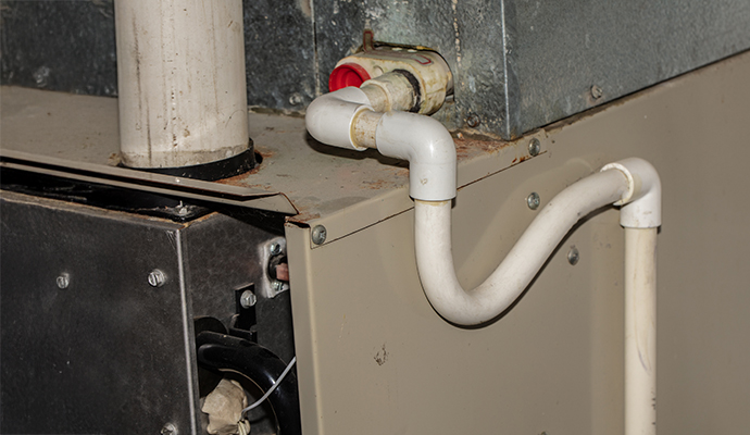 Routing pipe for AC drainage system