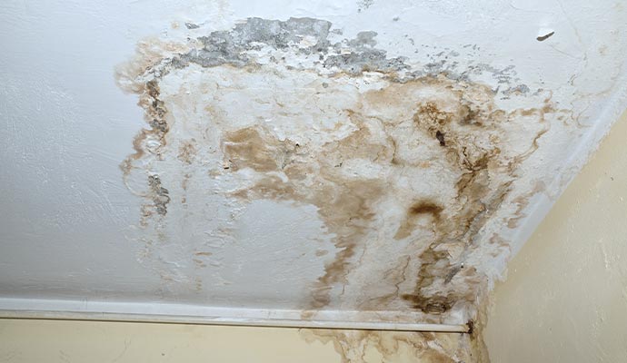 Stained ceiling due to water damage Stained ceiling due to water damage