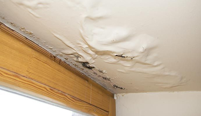 Severely water-damaged ceiling